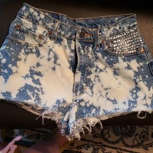 Acid wash high wait cutoff bling shorts. 11/12